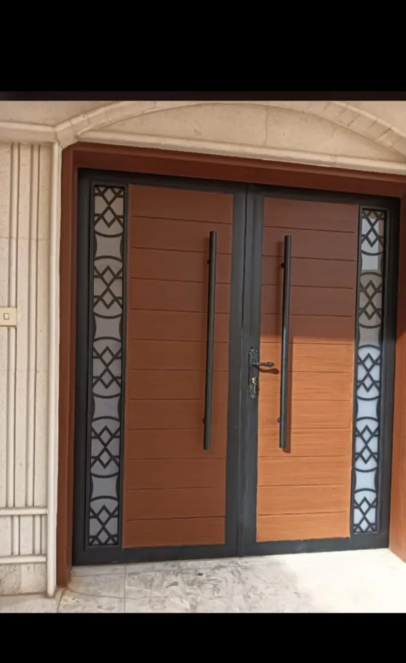 Wood-tone double entrance — Marhaba Aluminium & Metal Works