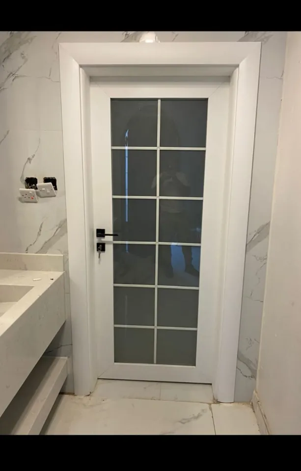 White framed glass door — Marhaba Aluminium & Metal Works