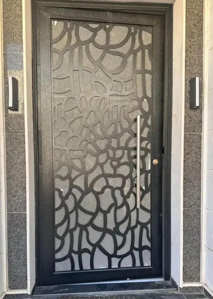 Decorative bronze-tone entrance — Marhaba Aluminium & Metal Works