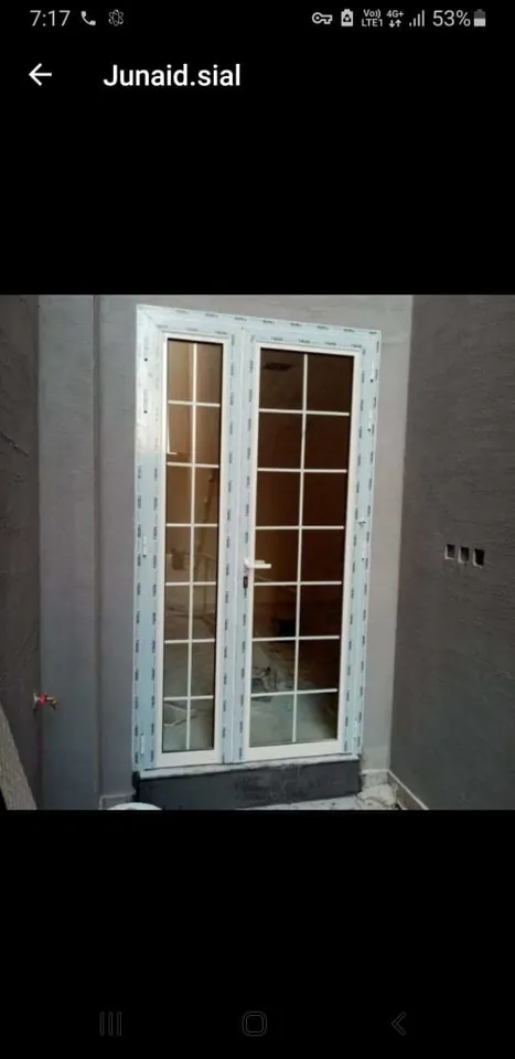 White multi-pane glass door — Marhaba Aluminium & Metal Works