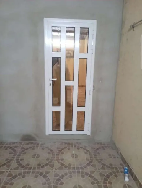Tall glazed entry door — Marhaba Aluminium & Metal Works