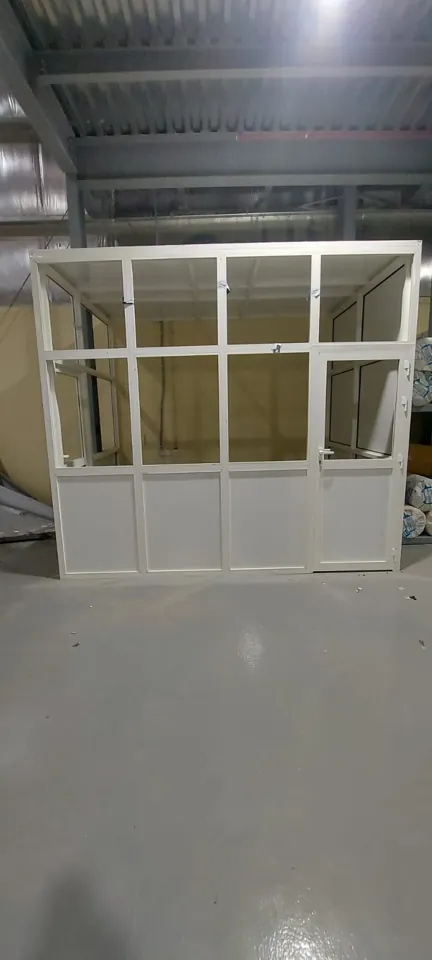 White glazed door in the workshop — Marhaba Aluminium & Metal Works
