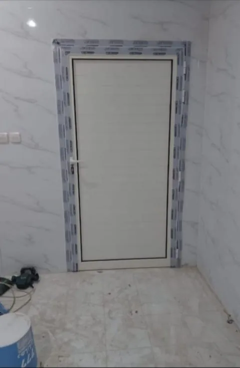 Plain panel entrance door — Marhaba Aluminium & Metal Works