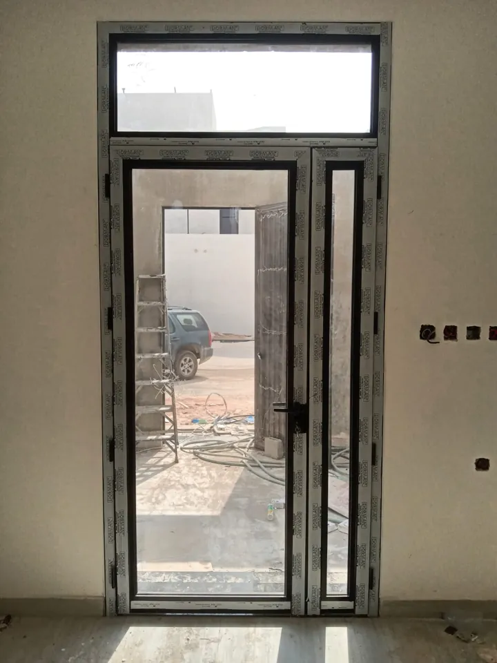 Glazed entrance with upper transom — Marhaba Aluminium & Metal Works