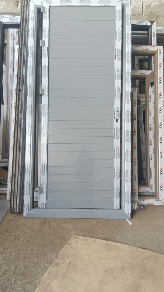 White framed door assembly — Marhaba Aluminium & Metal Works