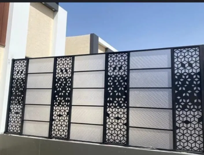 Mixed-panel decorative driveway gate — Marhaba Aluminium & Metal Works