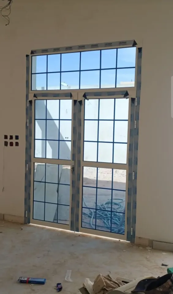 Tall window with upper transom — Marhaba Aluminium & Metal Works