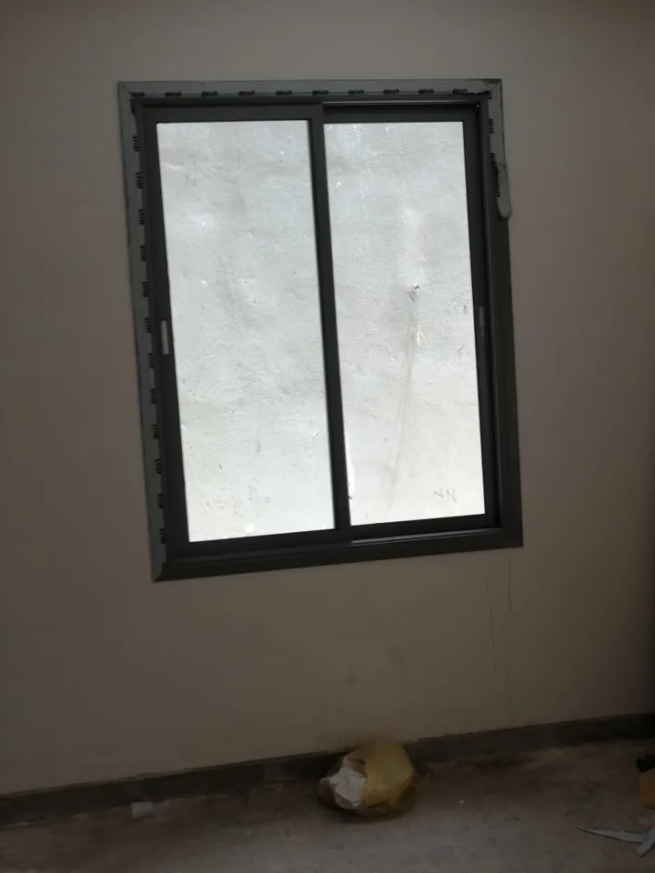Black sliding window — Marhaba Aluminium & Metal Works