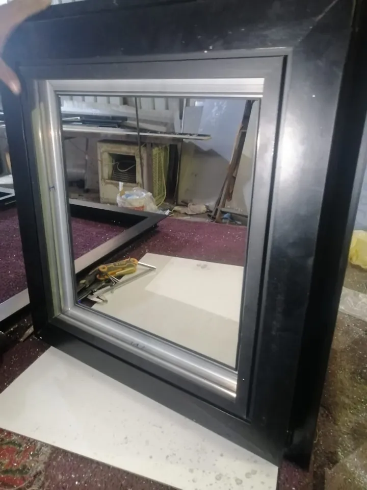Completed dark window frame — Marhaba Aluminium & Metal Works